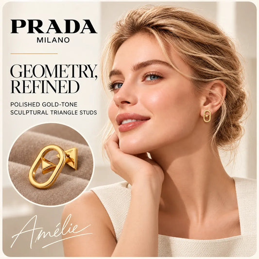 Prada gold-tone open triangle geometric stud earrings worn by a blonde model in a bright boutique