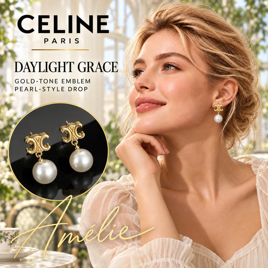 CELINE Gold-Tone Emblem Pearl-Style Drop Earrings – Daylight Edit — model view with circular product close-up