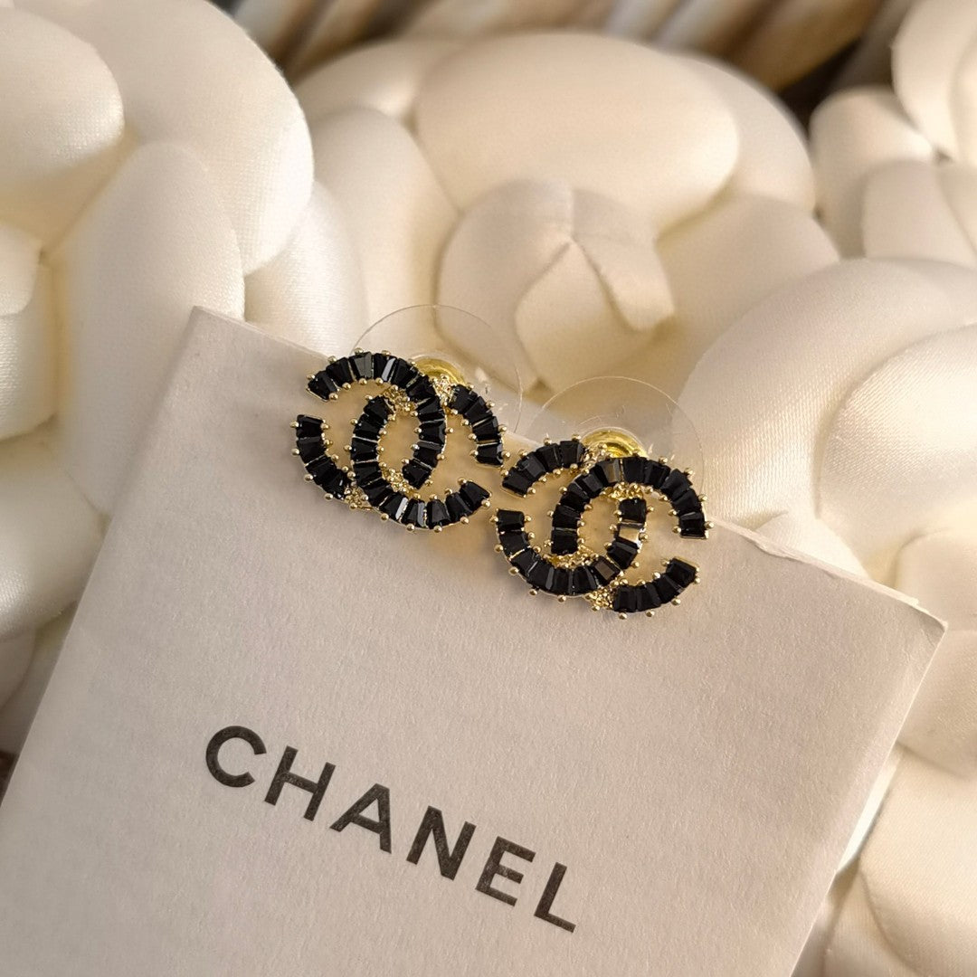 black 925 sterling silver letter Stud Earrings for women - product detail view