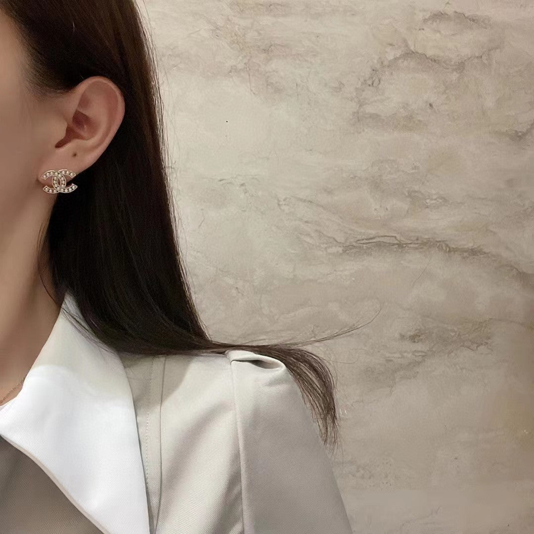 gold brass letter Stud Earrings for women - alternate angle view 2