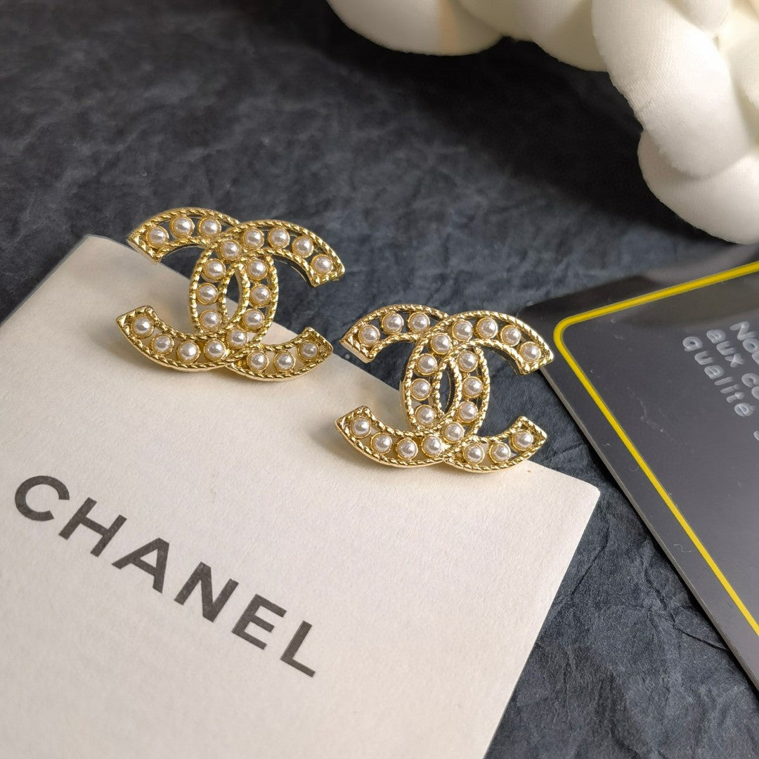 gold brass letter Stud Earrings for women - product detail view