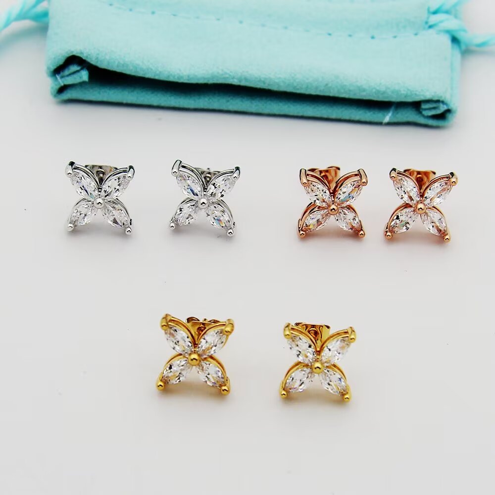gold floral Stud Earrings for women - alternate angle view 2