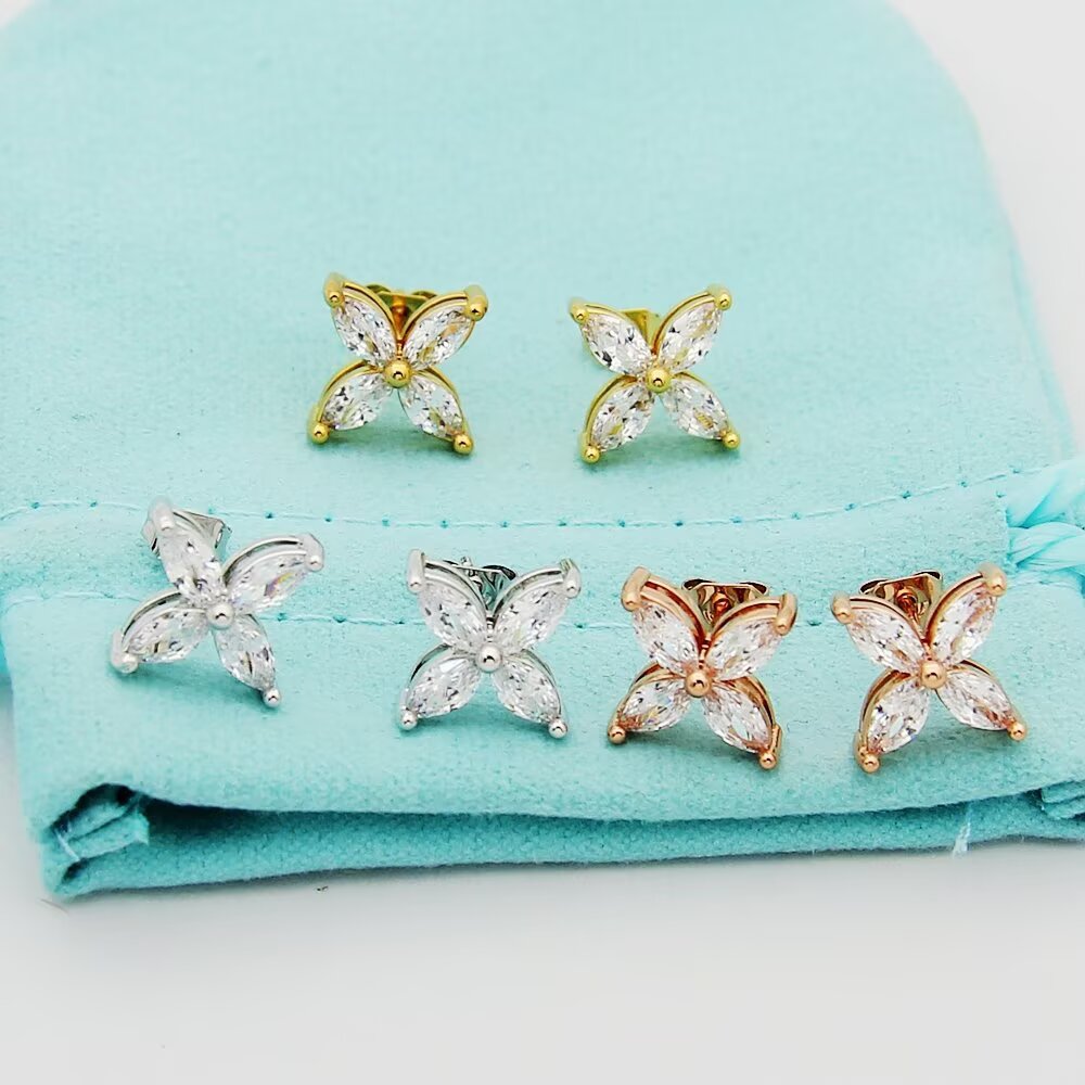 gold floral Stud Earrings for women - alternate angle view 3