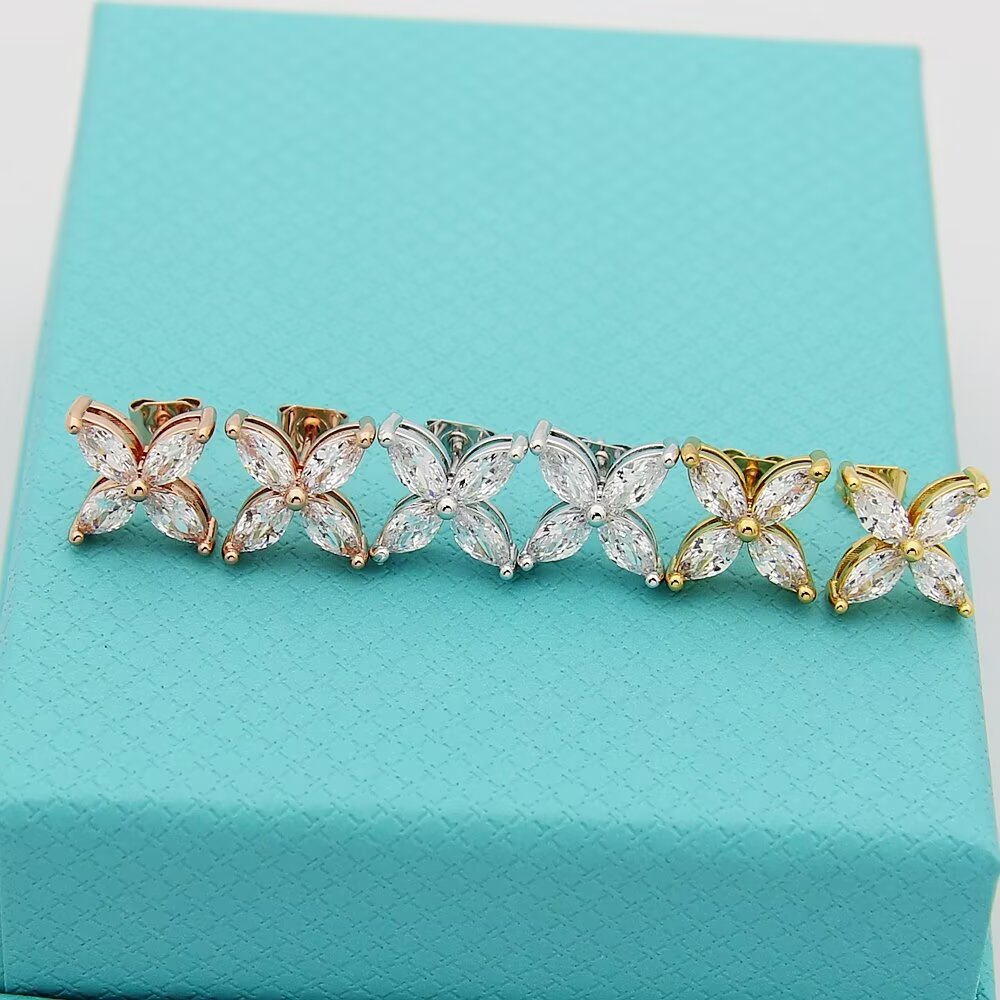 gold floral Stud Earrings for women - alternate angle view 5