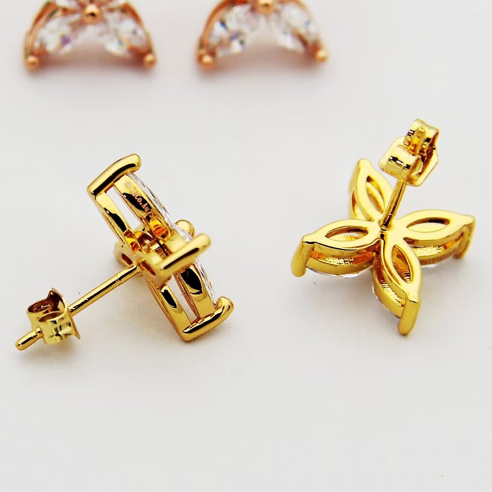 gold floral Stud Earrings for women - alternate angle view 9