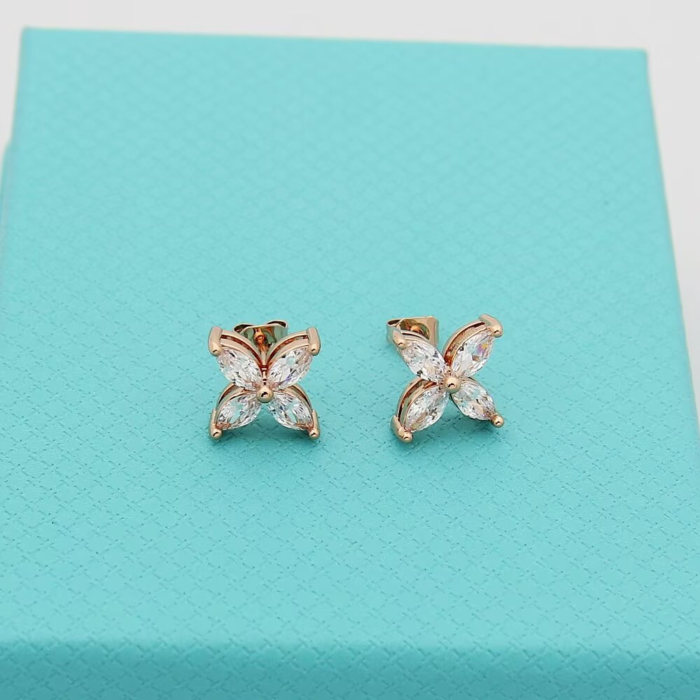 gold floral Stud Earrings for women - alternate angle view 6