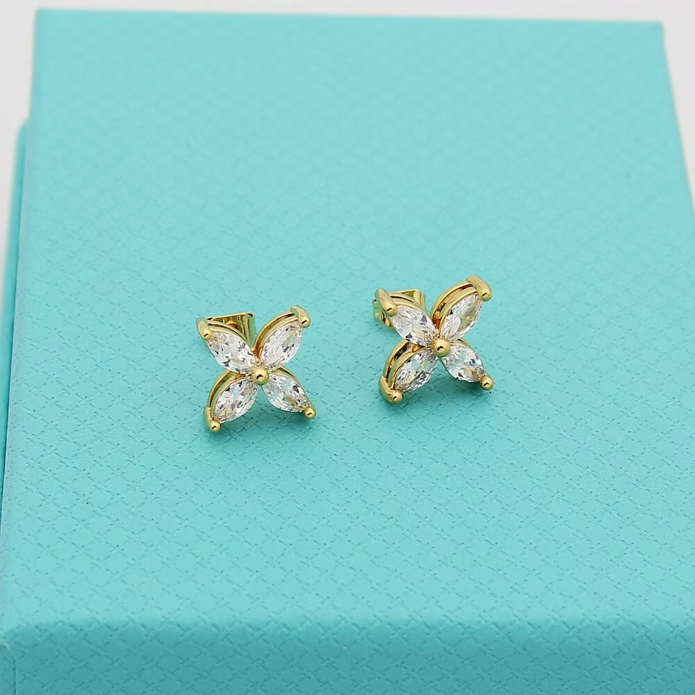 gold floral Stud Earrings for women - alternate angle view 8
