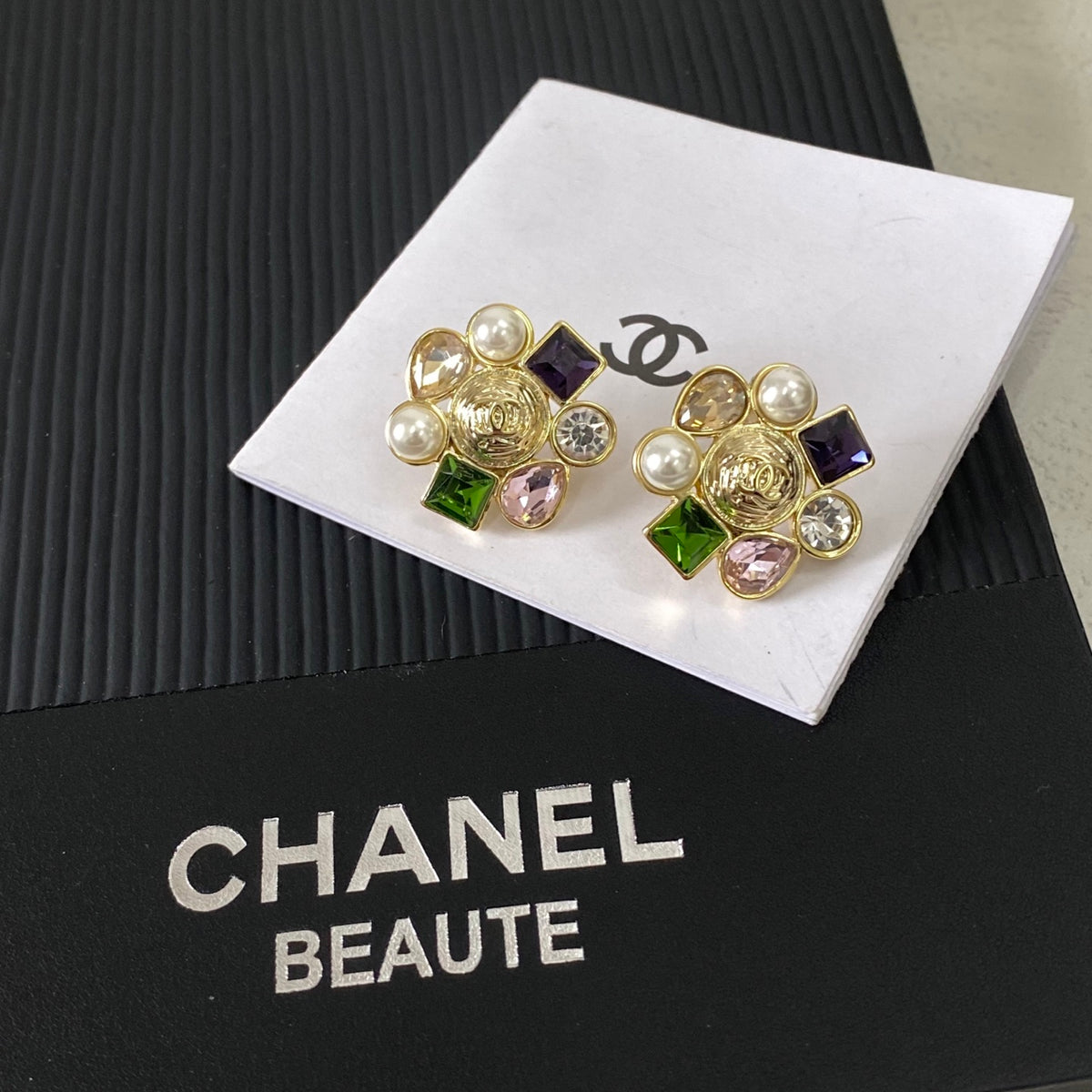 gold pearl letter Stud Earrings for women - product detail view