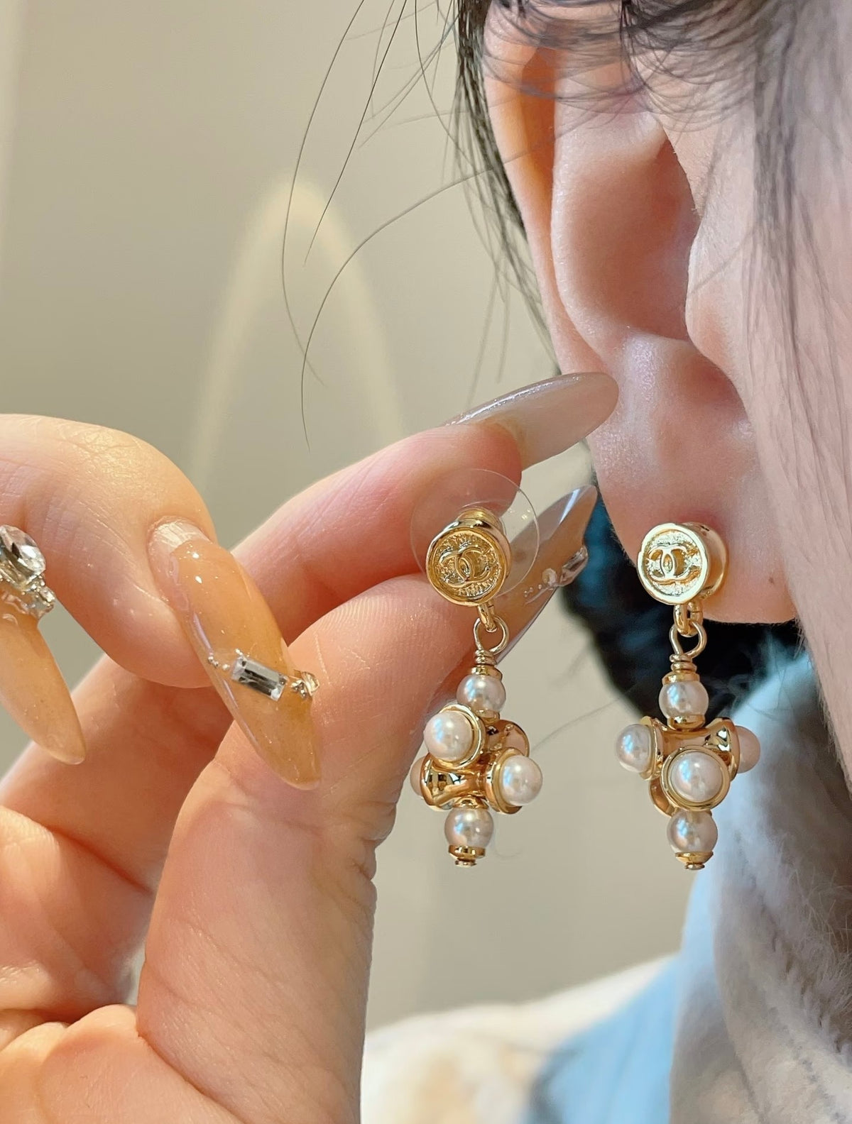 light gold letter Stud Earrings for women - alternate angle view 2