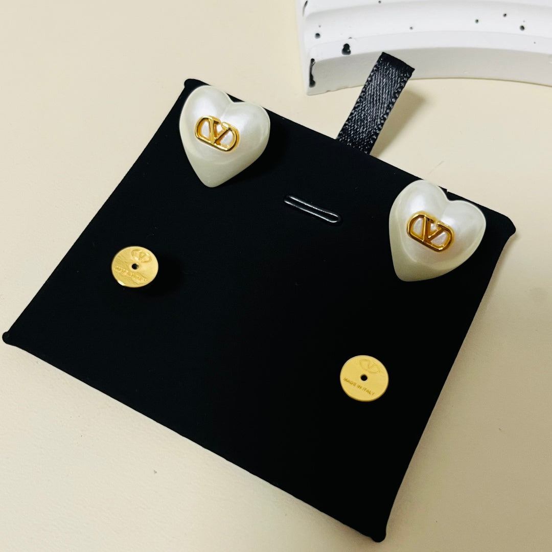 gold minimalist Stud Earrings for women - alternate angle view 4