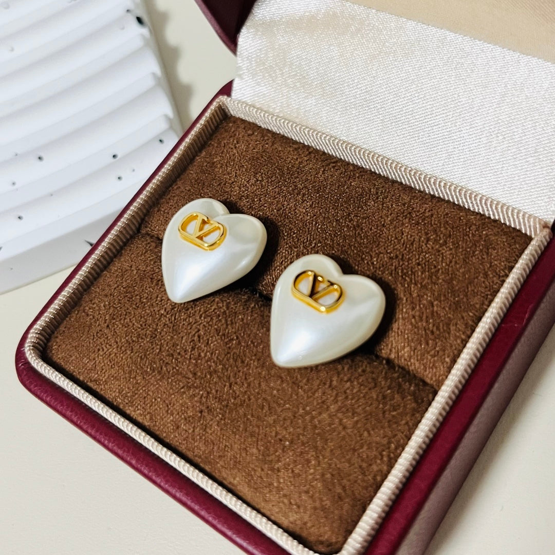 gold minimalist Stud Earrings for women - alternate angle view 3