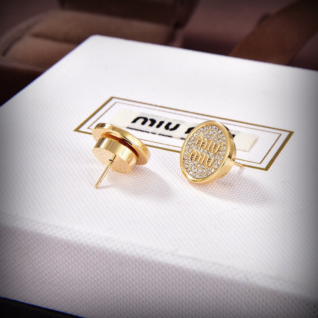 yellow brass letter Stud Earrings for women - product detail view