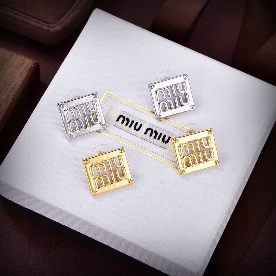 yellow brass letter Stud Earrings for women - product detail view
