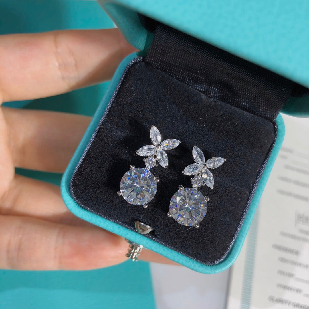 gold crystal inlaid Stud Earrings for women - product detail view