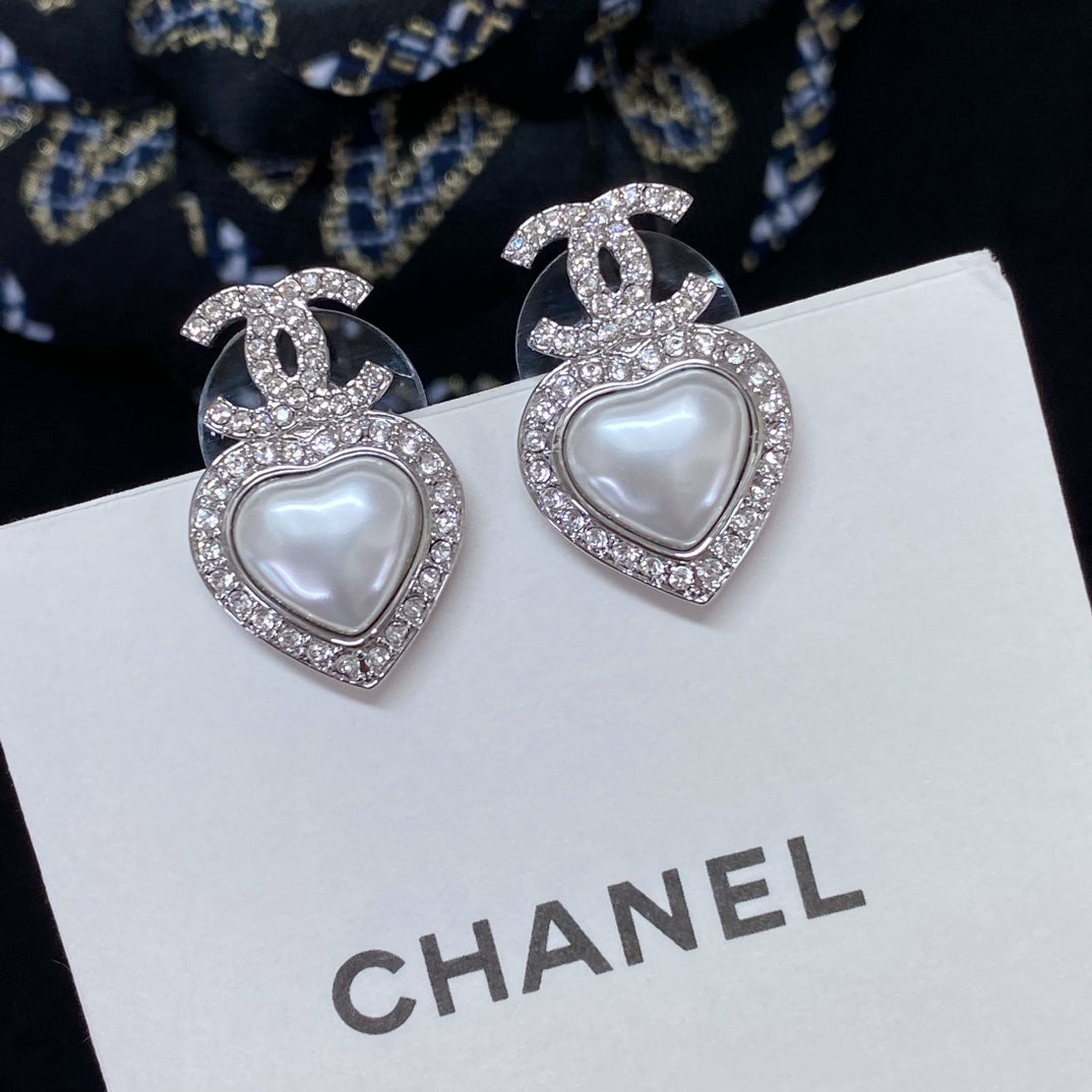 silver pearl heart Stud Earrings for women - product detail view