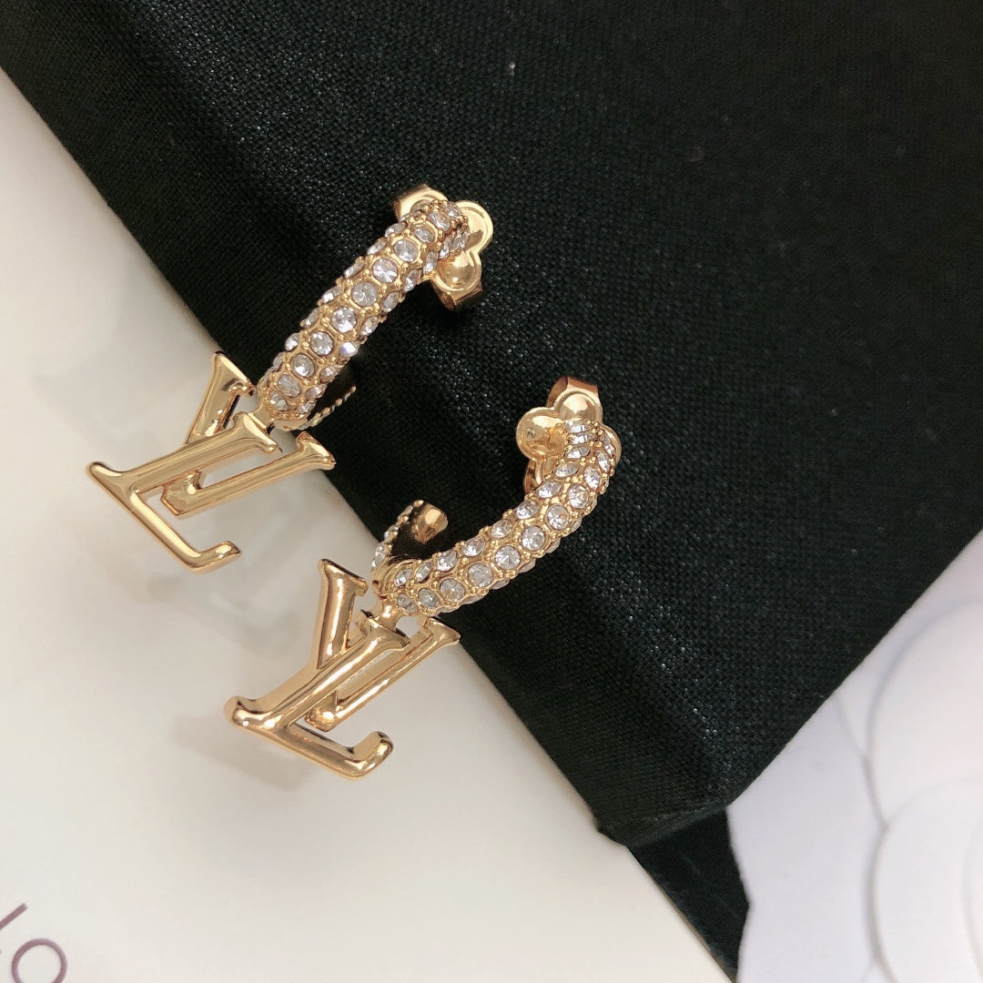 yellow brass letter Stud Earrings for women - alternate angle view 4