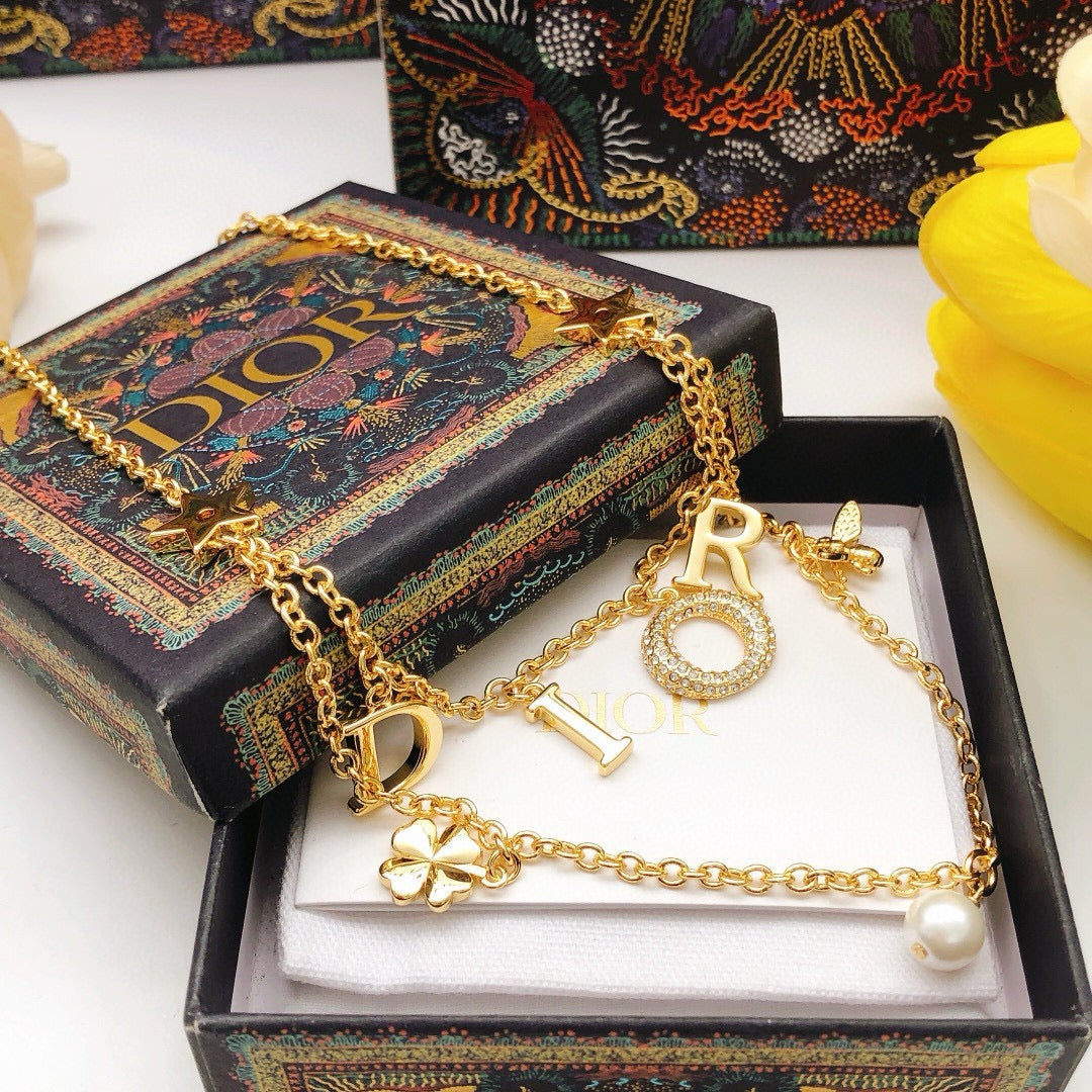 yellow brass letter Necklace for women - alternate angle view 3