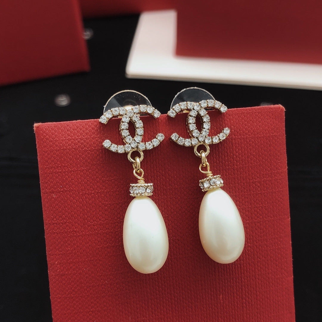 yellow brass pearl Stud Earrings for women - product detail view
