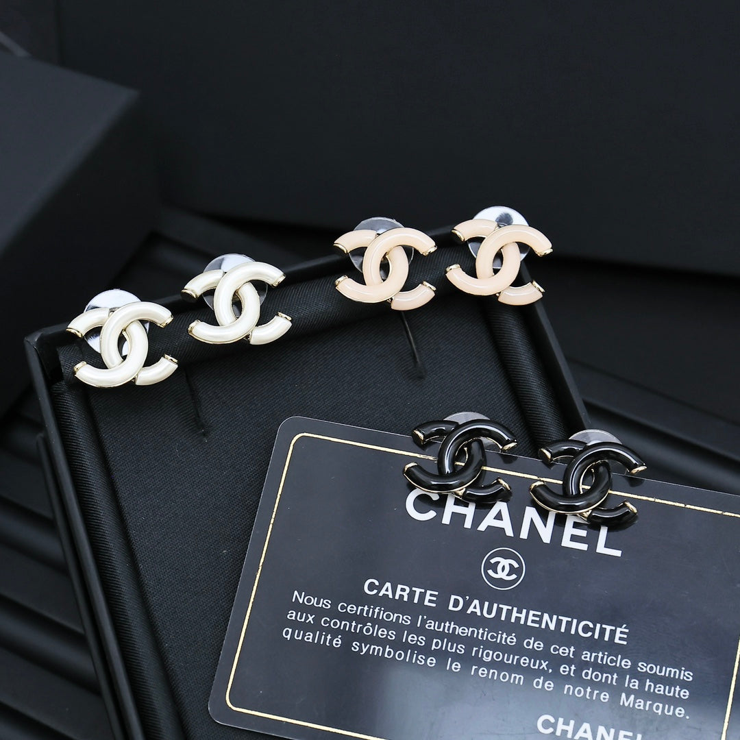 light gold acrylic double c Stud Earrings for women - product detail view