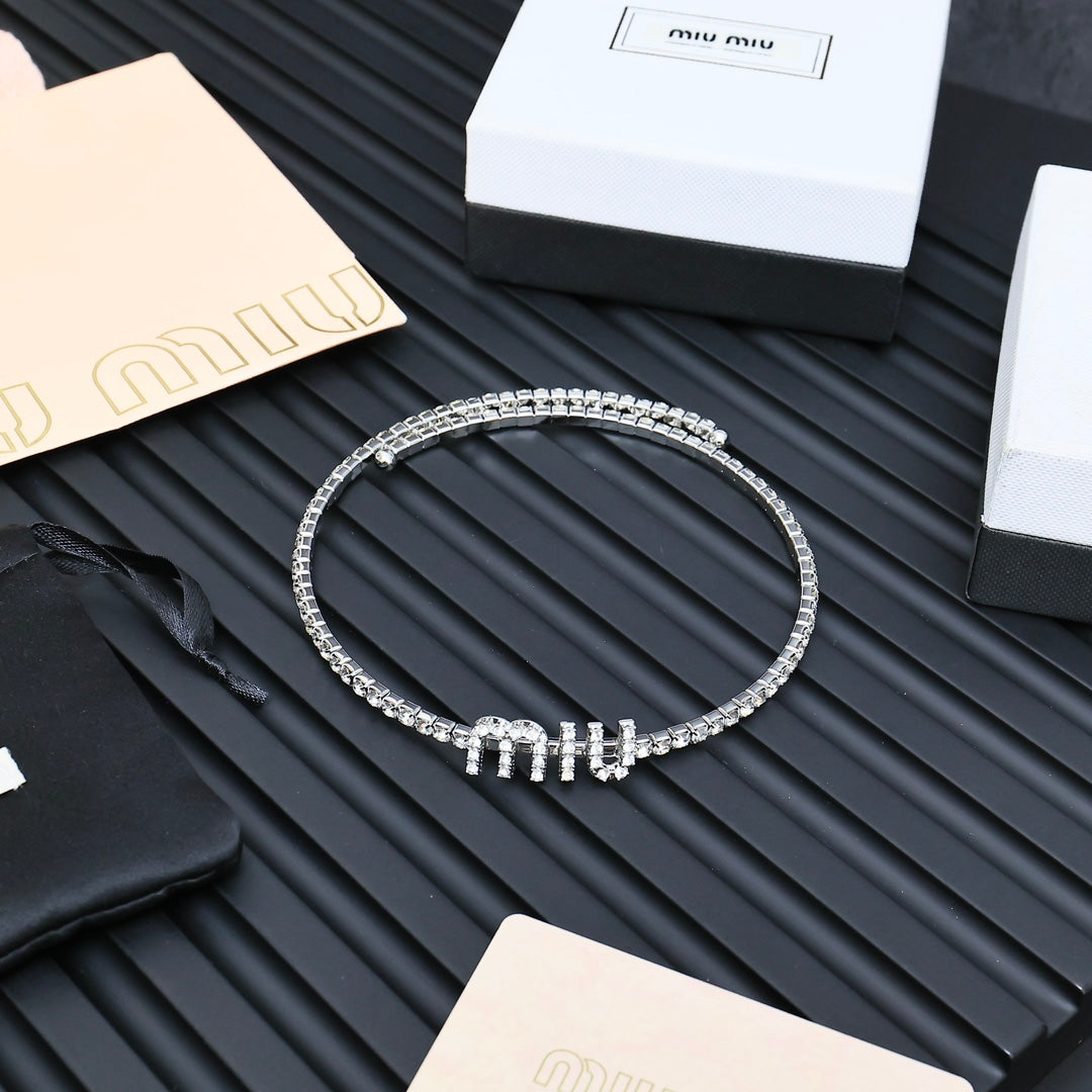 gold brass letter fashion accessory for women - product detail view