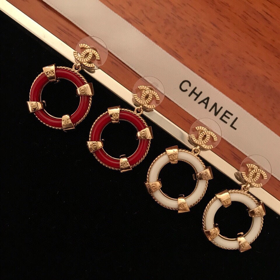 yellow brass double c Stud Earrings for women - product detail view