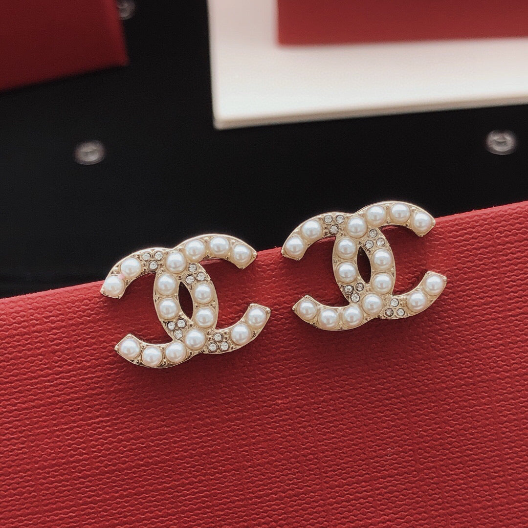 beige brass Stud Earrings for women - product detail view