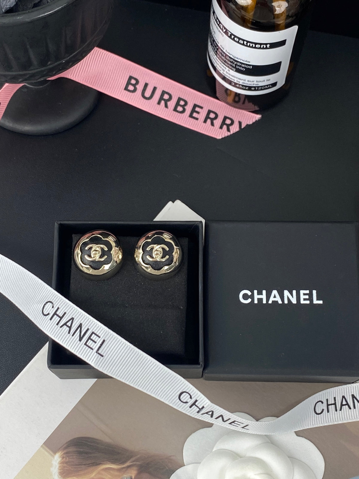 gold leather floral Stud Earrings for women - product detail view
