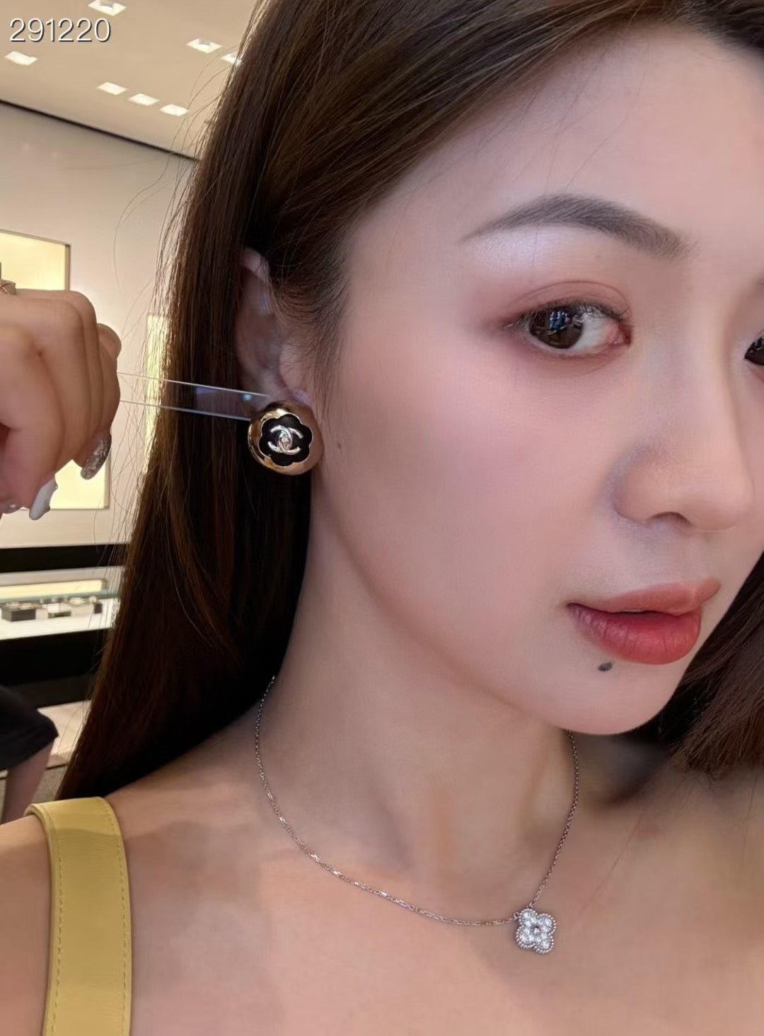 gold leather floral Stud Earrings for women - alternate angle view 6