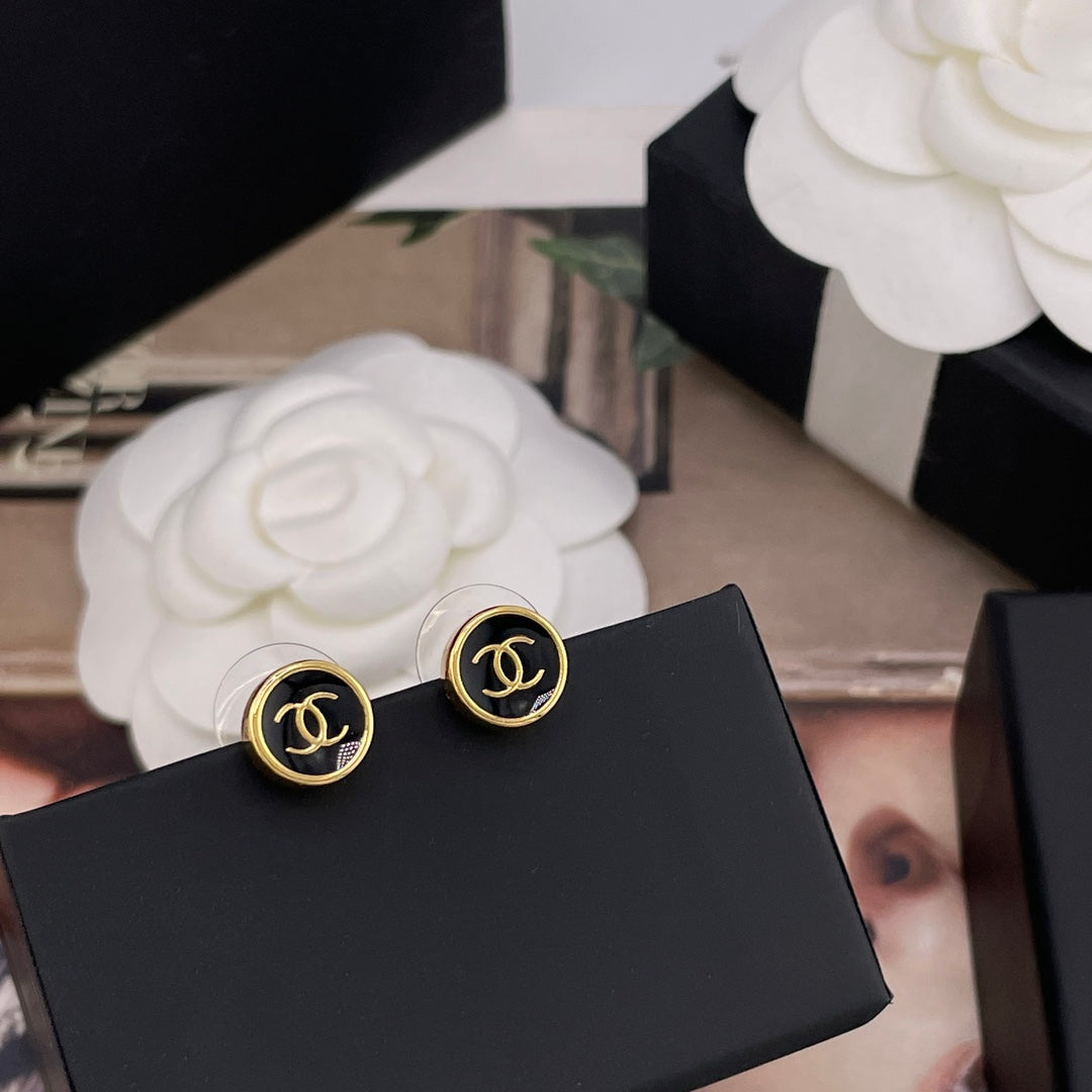 gold enamel vintage Stud Earrings for unisex couple - product detail view