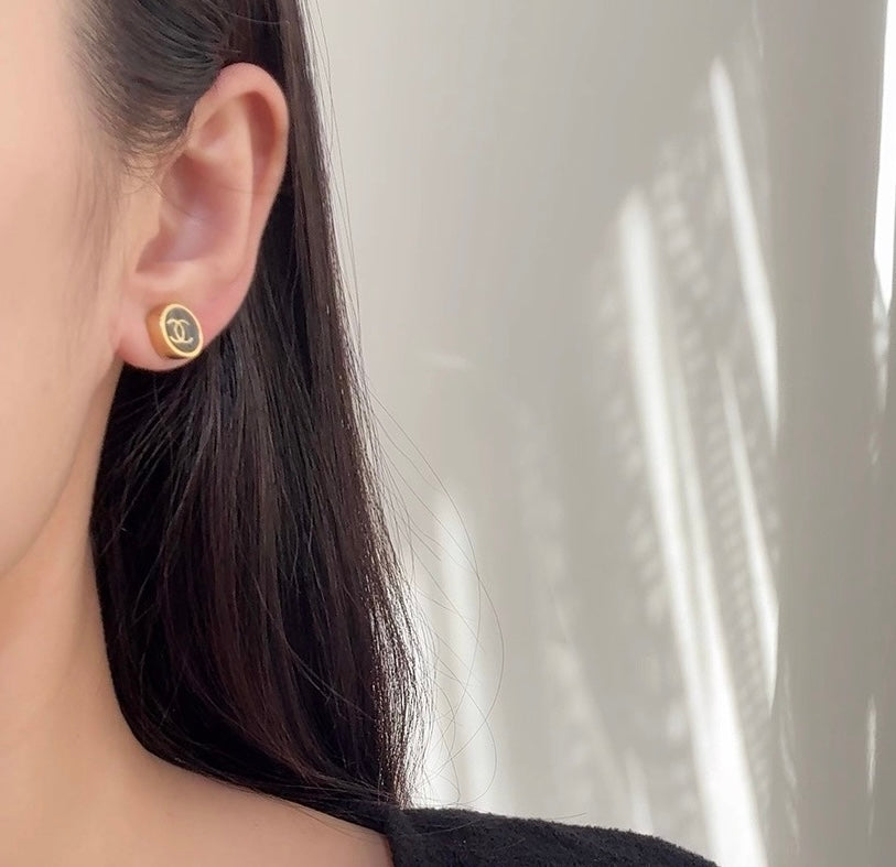 gold enamel vintage Stud Earrings for unisex couple - product detail view