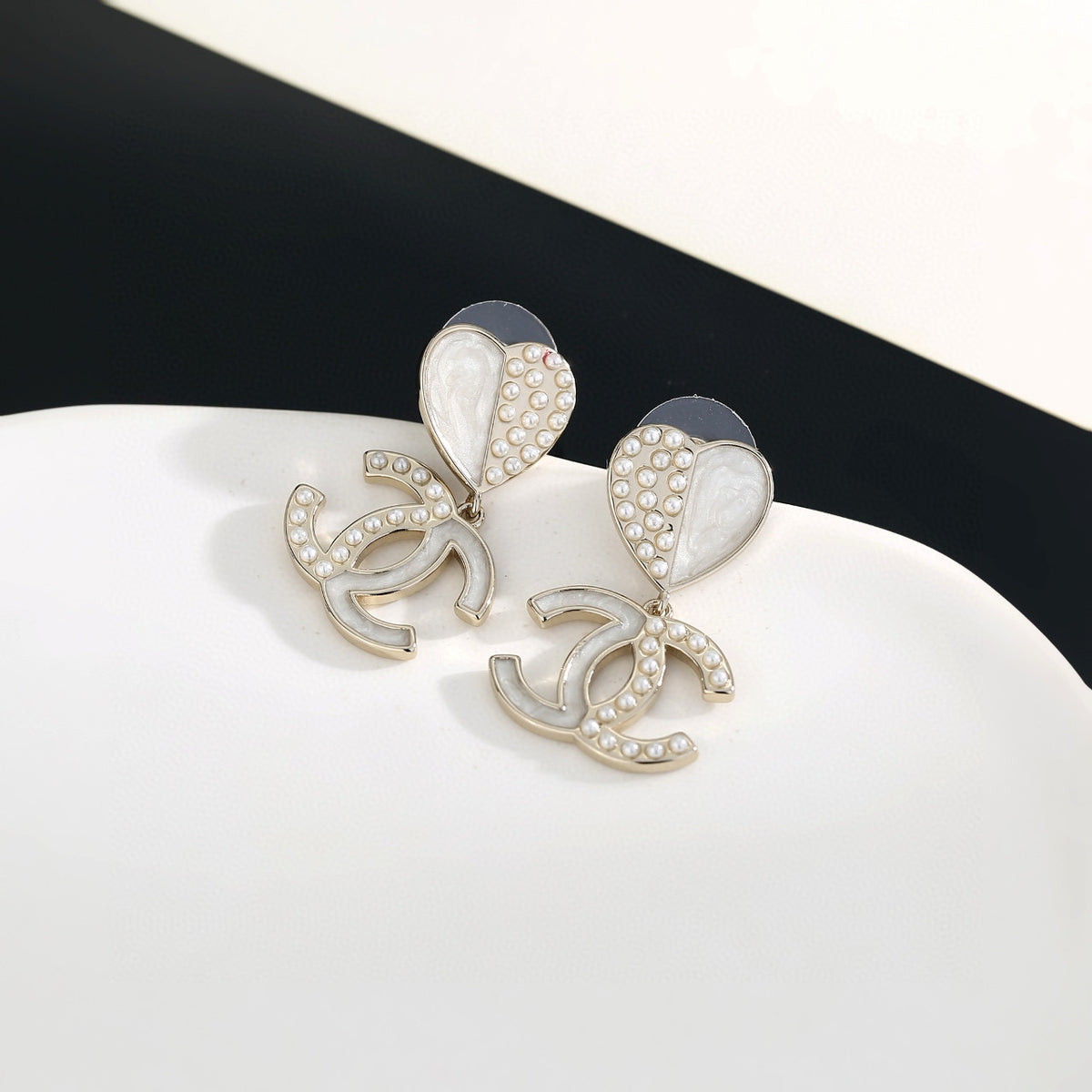 gold resin heart Stud Earrings for women - product detail view