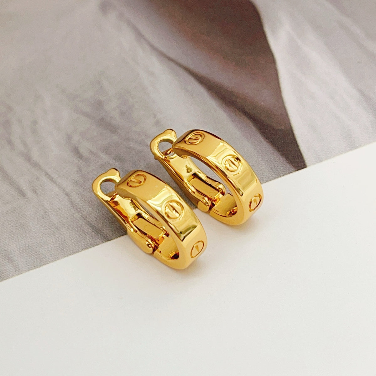 gold brass luxury Stud Earrings for women - product detail view
