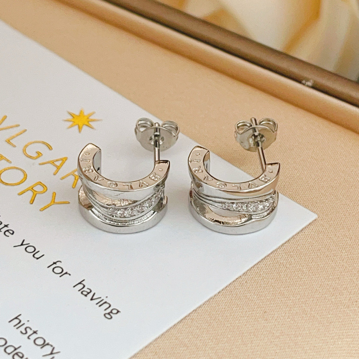 silver brass crystal inlaid Stud Earrings for women - product detail view