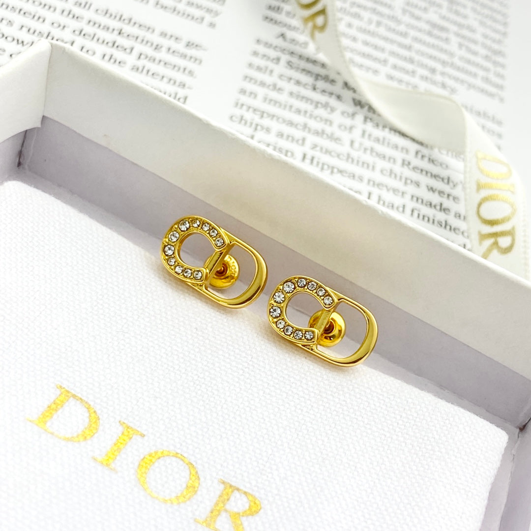 gold crystal inlaid Stud Earrings for women - product detail view