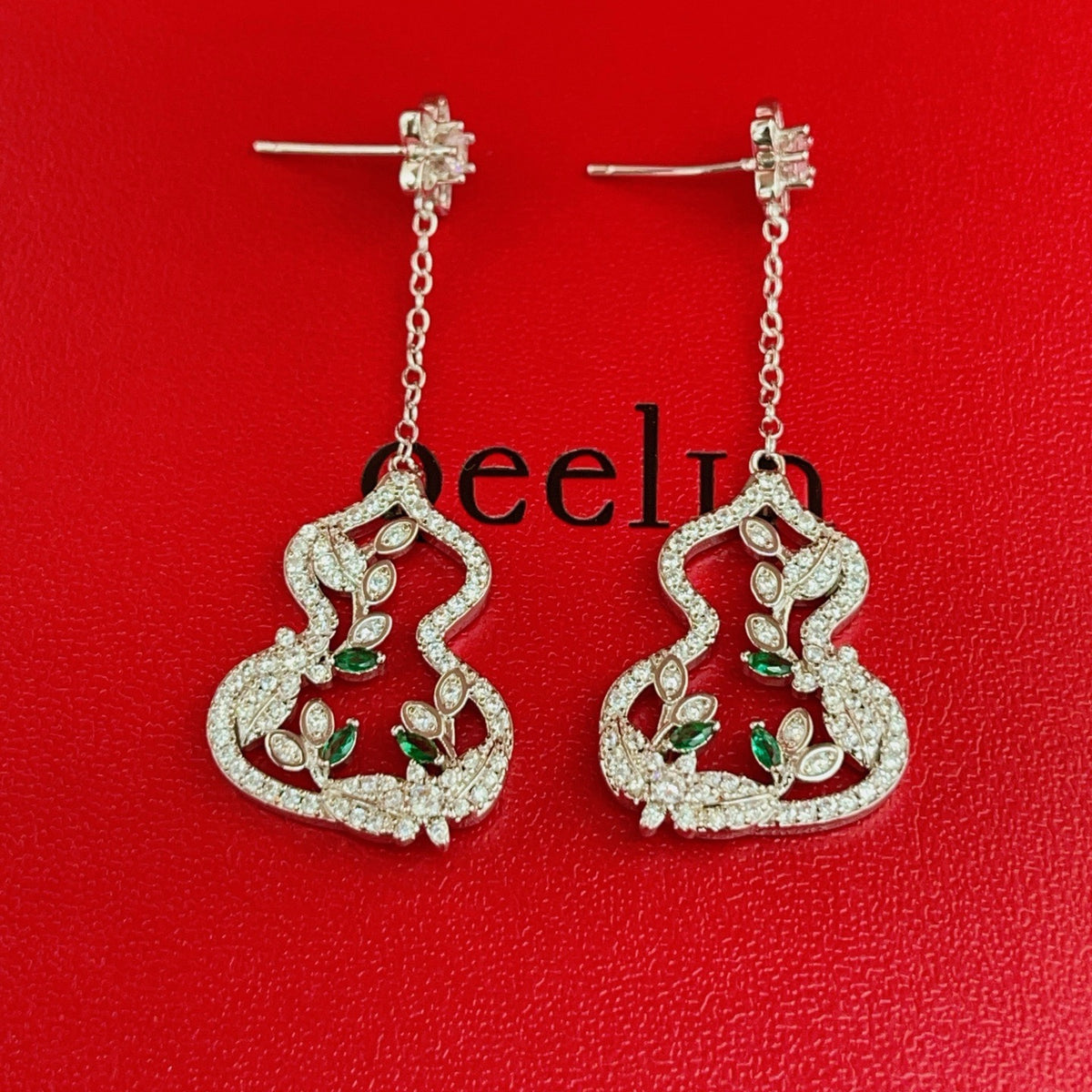 silver brass luxury Drop Earrings for women - product detail view