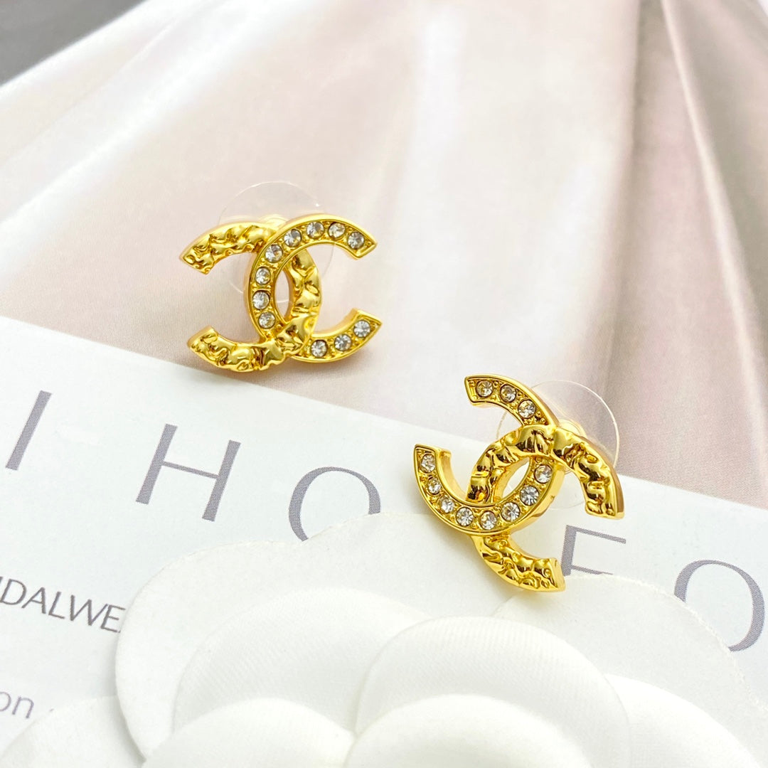 gold crystal embossed Stud Earrings for women - alternate angle view 5