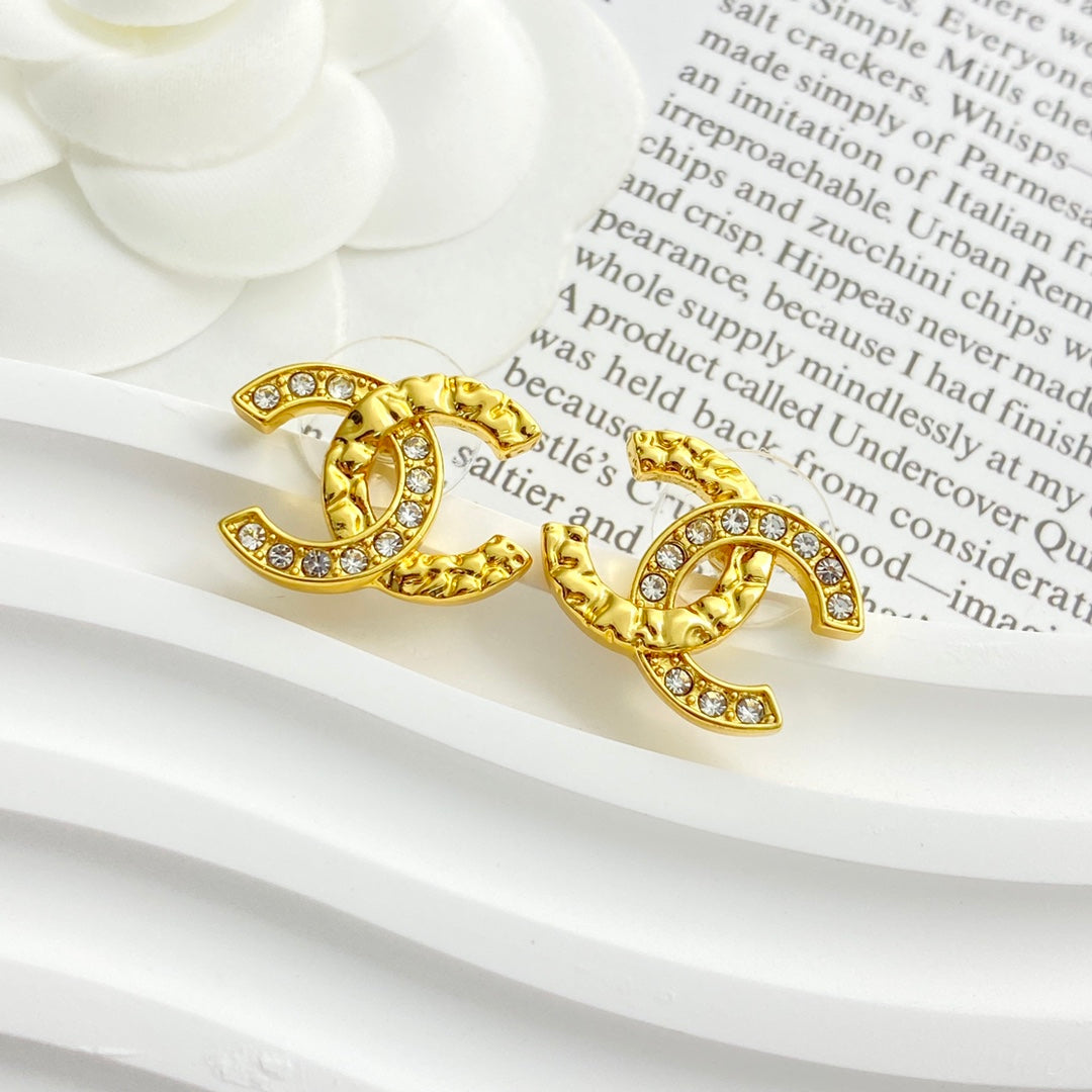gold crystal embossed Stud Earrings for women - alternate angle view 3