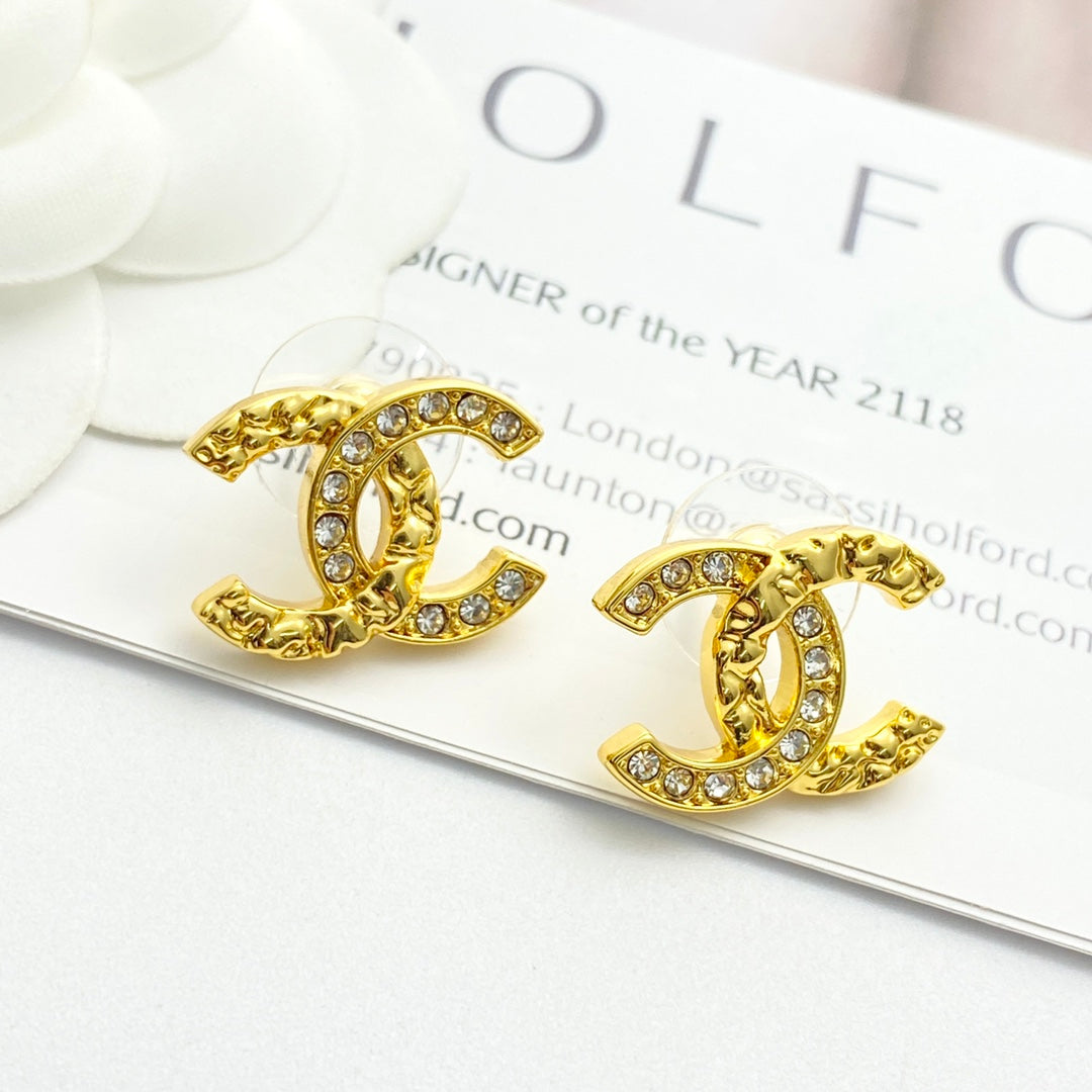 gold crystal embossed Stud Earrings for women - alternate angle view 2