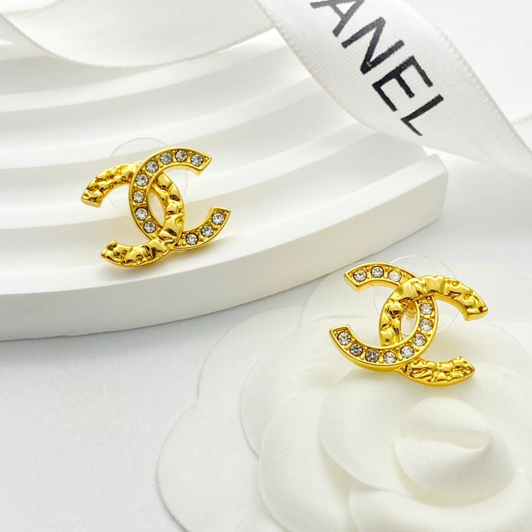 gold crystal embossed Stud Earrings for women - product detail view
