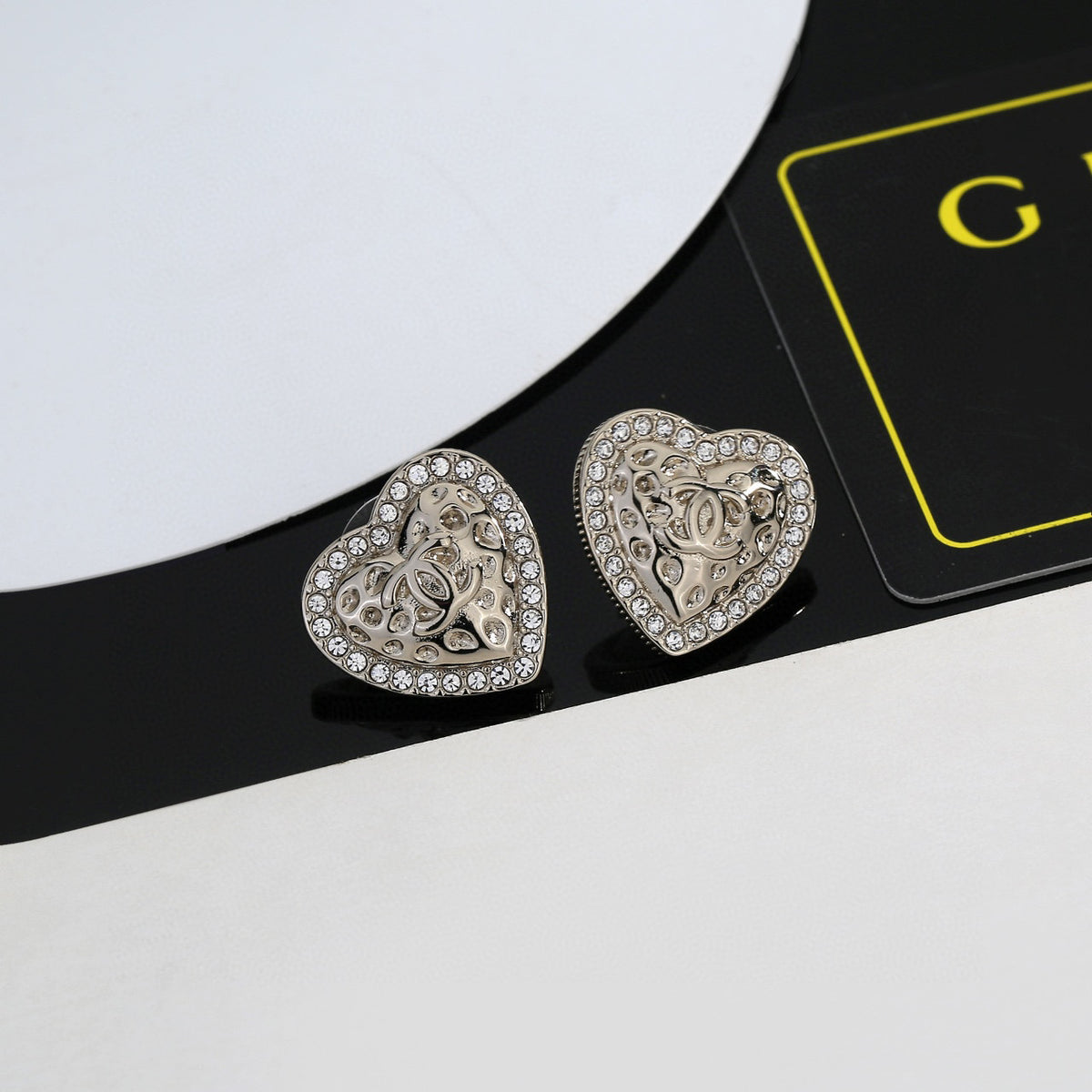 gold resin heart Stud Earrings for women - product detail view
