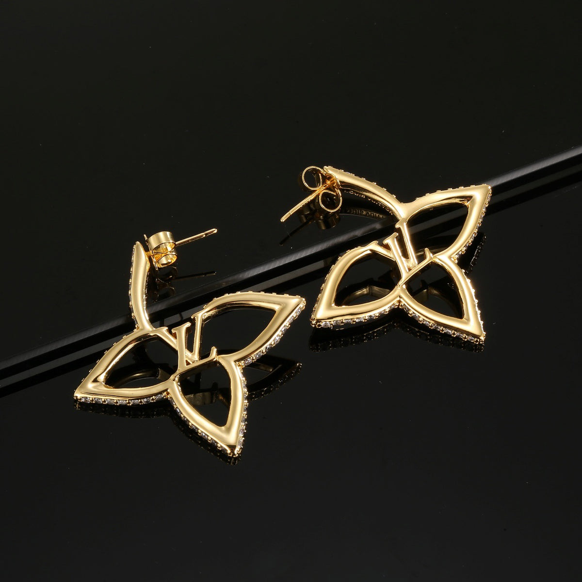 gold clover Stud Earrings for women - alternate angle view 2