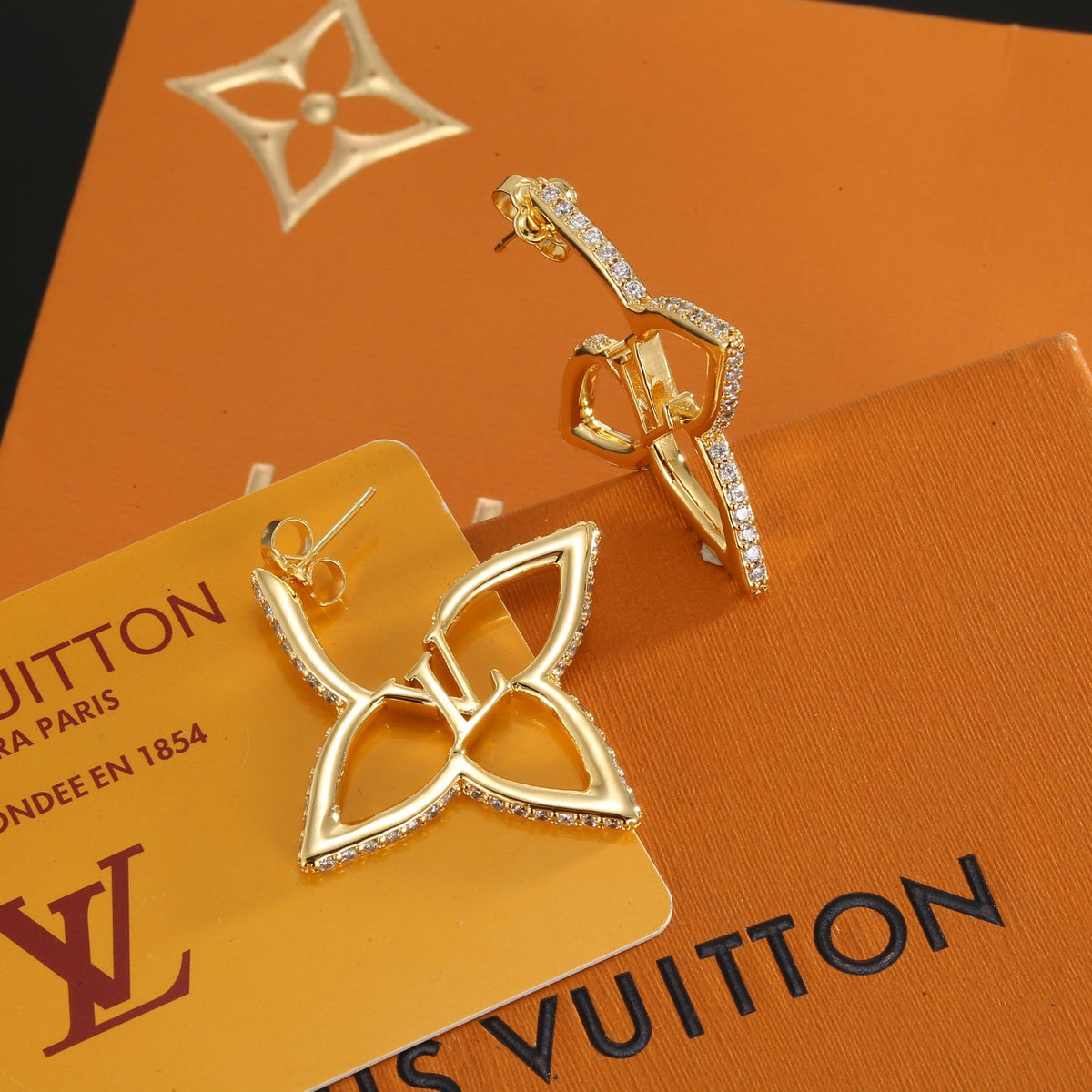 gold clover Stud Earrings for women - product detail view