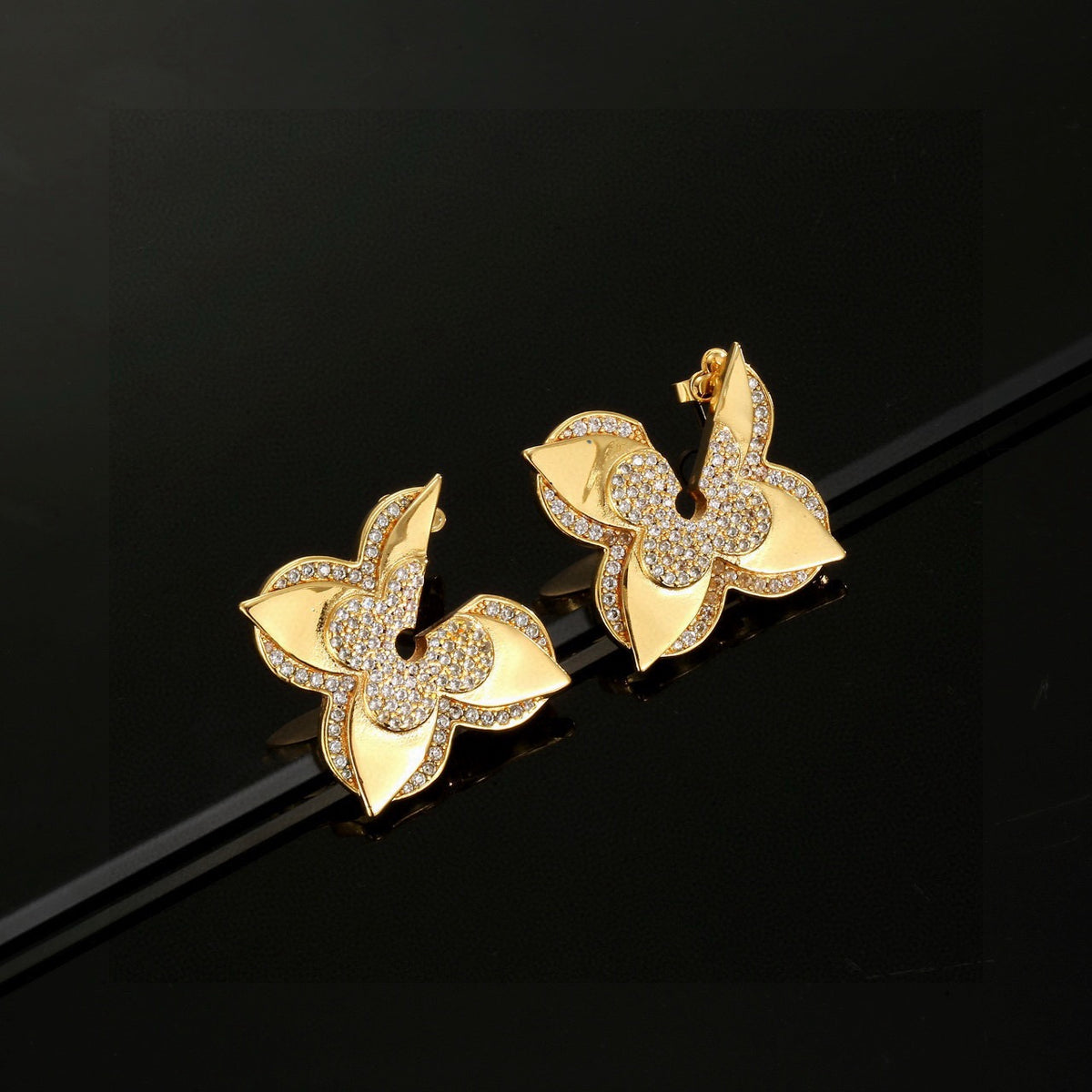 gold clover Stud Earrings for women - product detail view