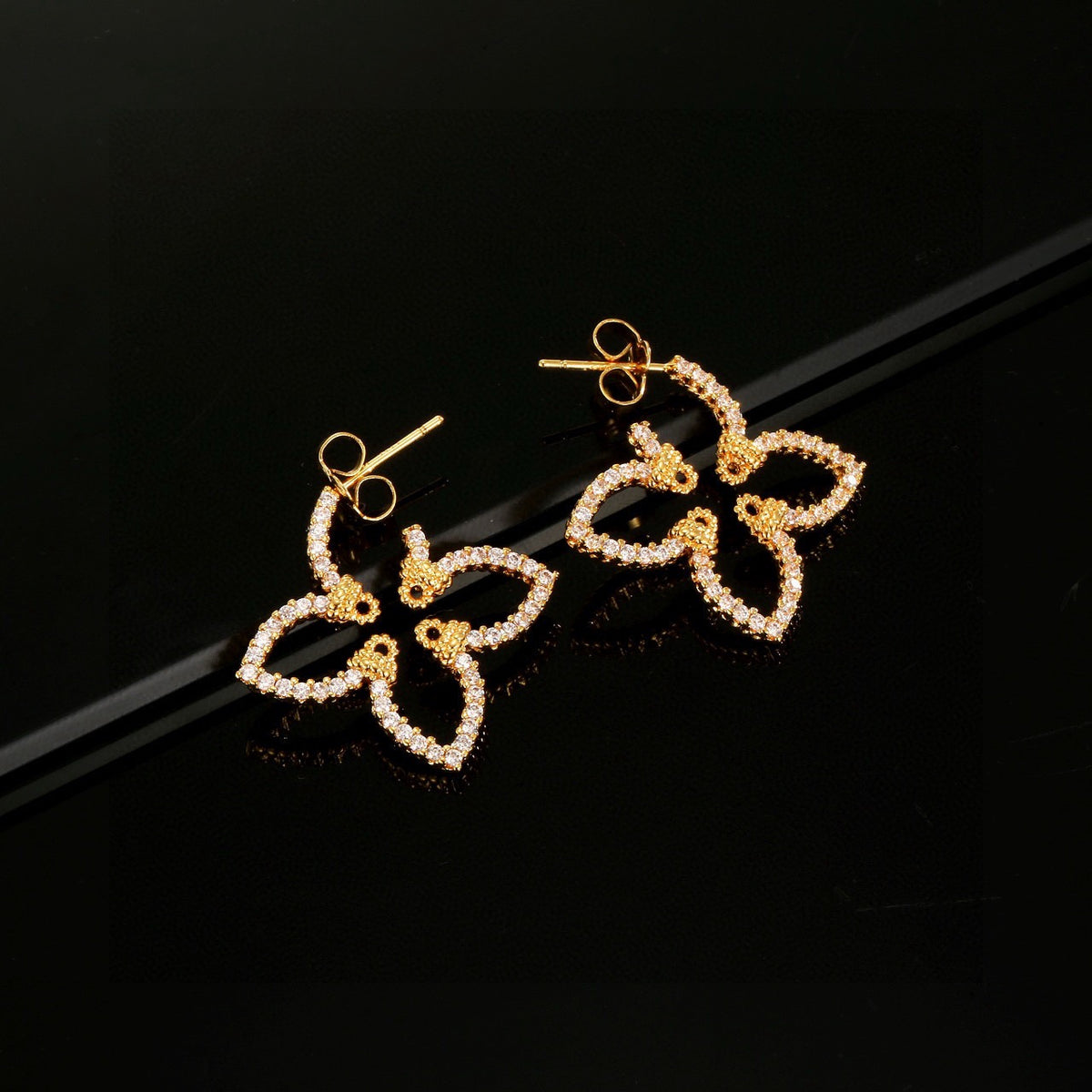 gold clover Stud Earrings for women - alternate angle view 2