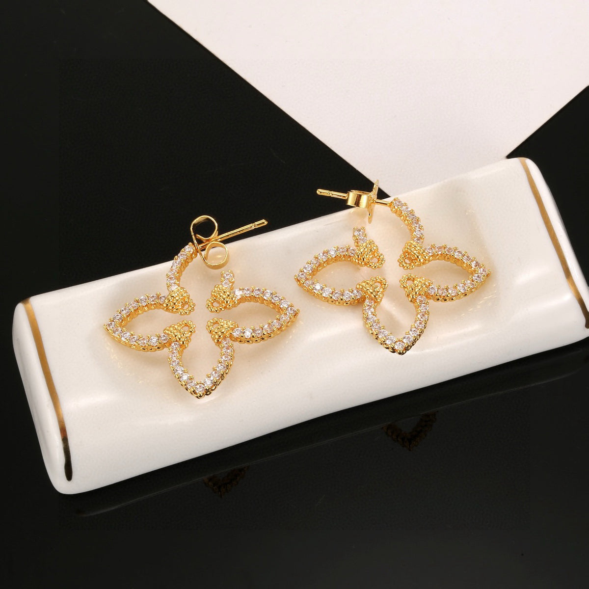 gold clover Stud Earrings for women - alternate angle view 6