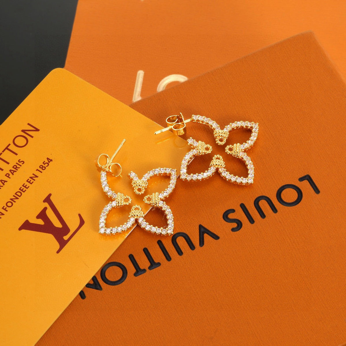 gold clover Stud Earrings for women - product detail view