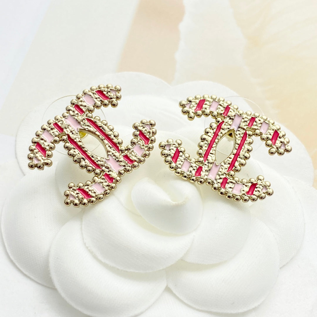 pink enamel floral Stud Earrings for women - alternate angle view 2