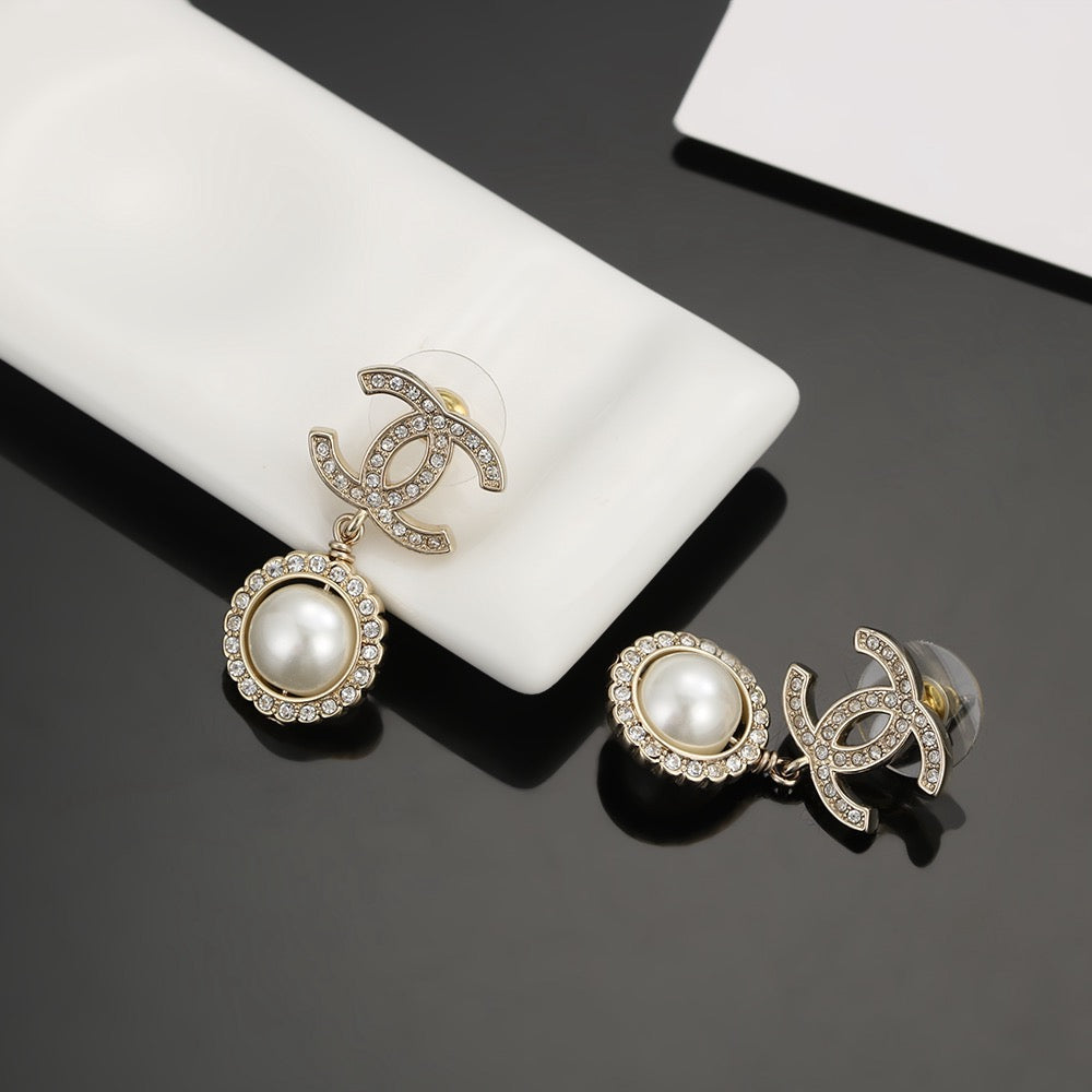 silver 925 sterling silver pearl Stud Earrings for women - product detail view