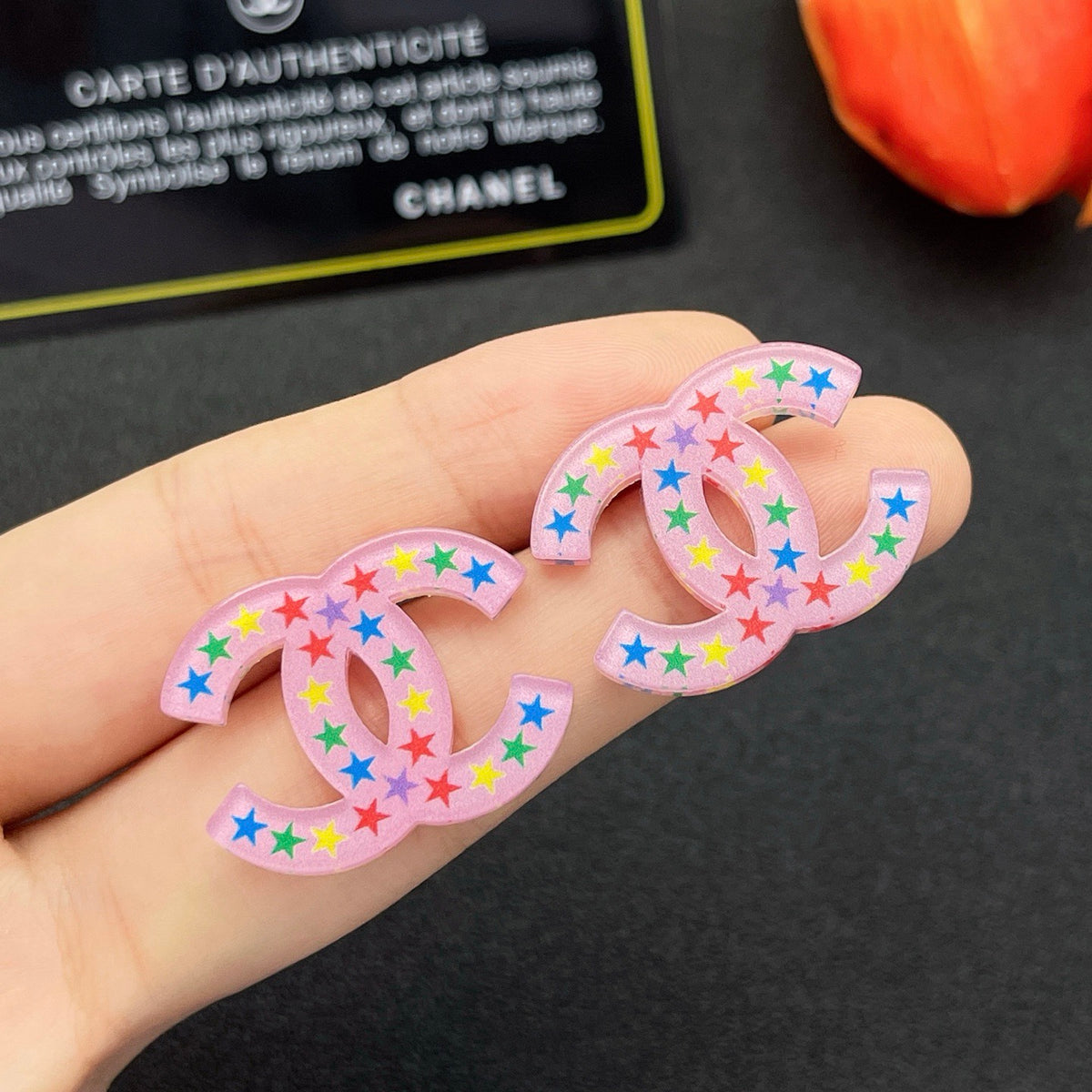 pink acrylic star Stud Earrings for women - product detail view