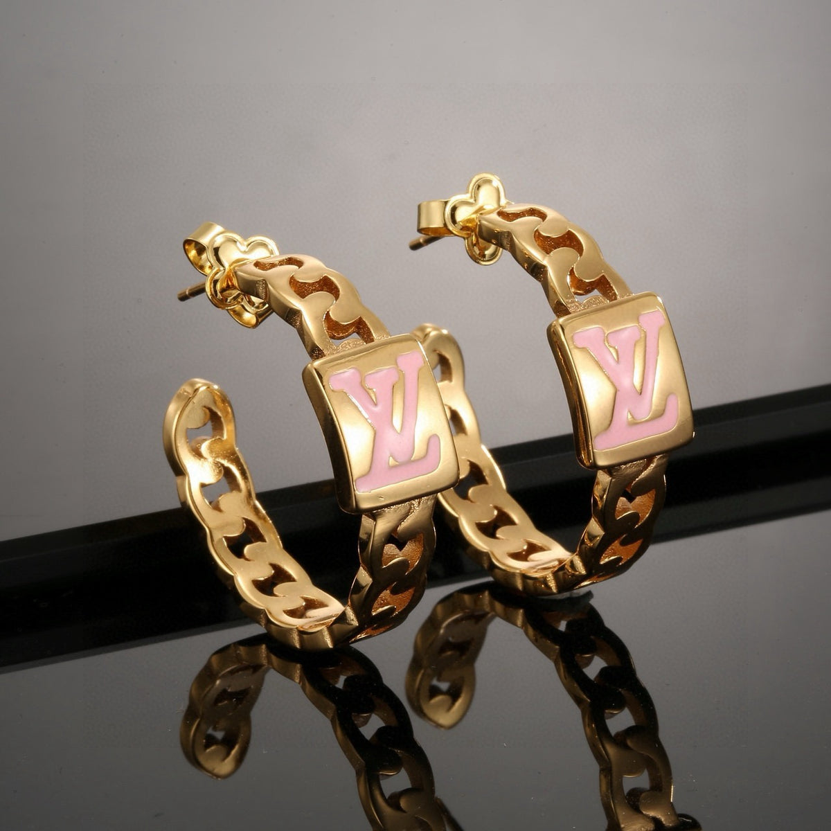 gold letter Stud Earrings for women - product detail view